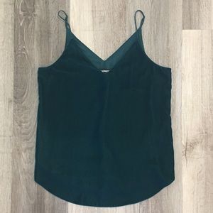 Blue-green velvet tank top.